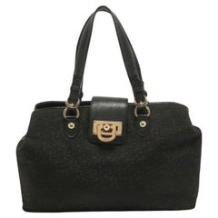 Bolso con solapa de lona y piel con monograma negro de Dkny