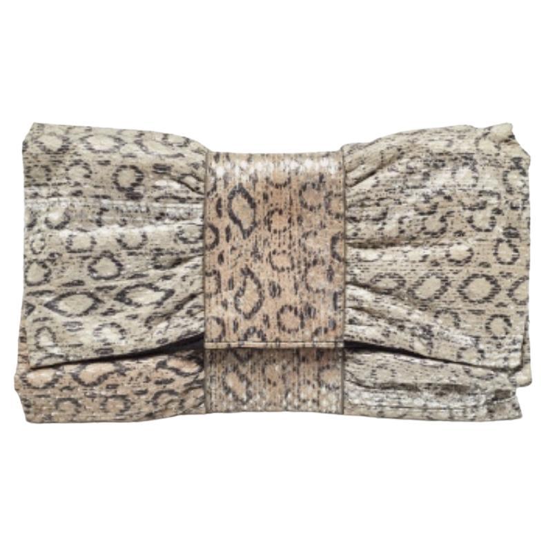 Furla Bolso de piel de serpiente gris/plata con lazo en relieve en venta