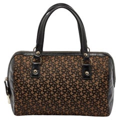 Cartera DKNY de lona marrón/negra y piel grabada con cocodrilo