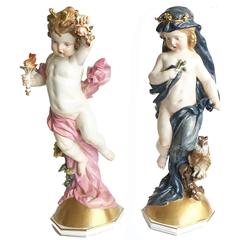 German Meissen Porcelain, Pair of Figures of Putti Emblematic of Night and Day