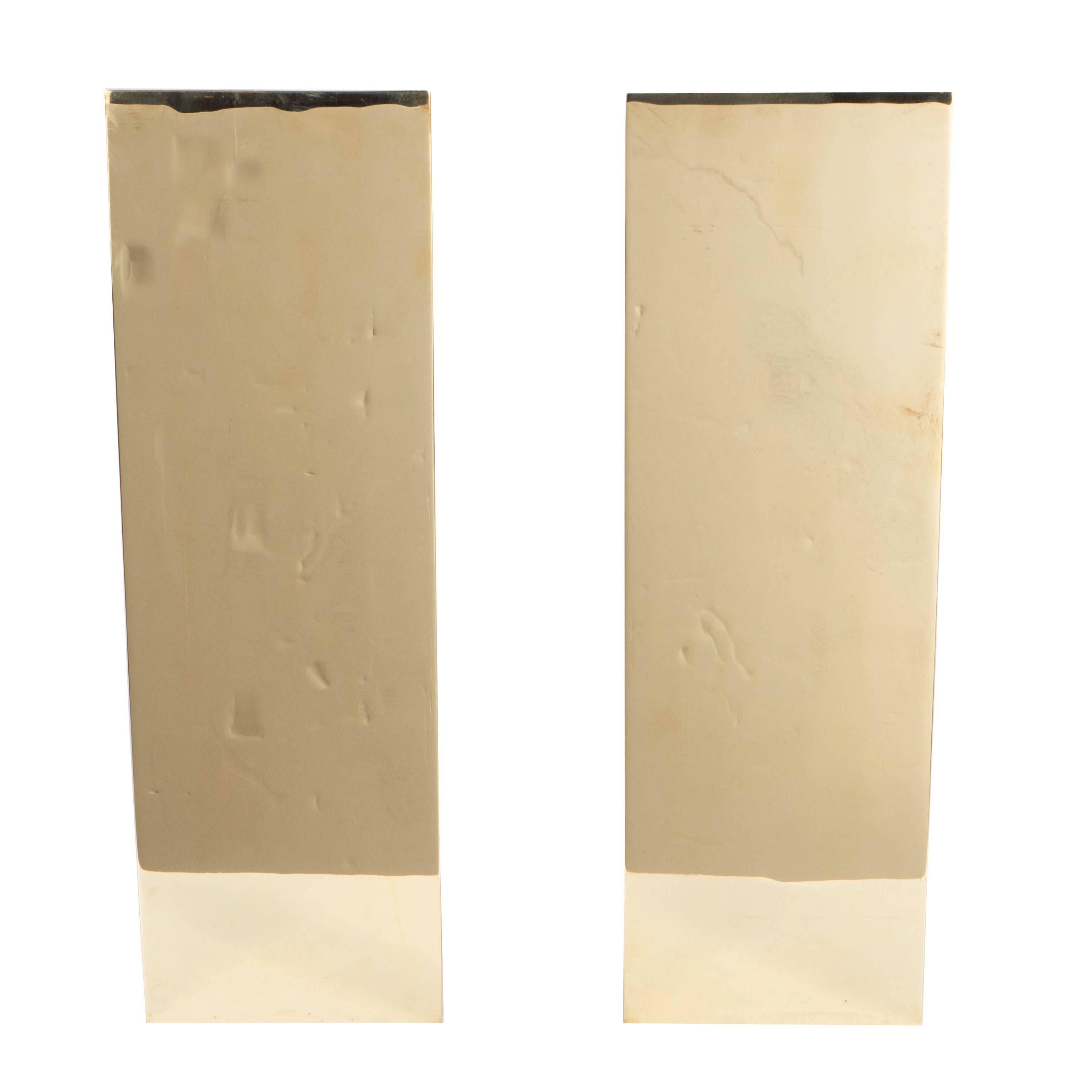 This ultra chic pair of custom andirons feature a minimalistic vertical rectangular front panel displayed in polished brass. They are fully customizable in terms of the dimensions and finish options include polished, brushed or antiqued nickel or
