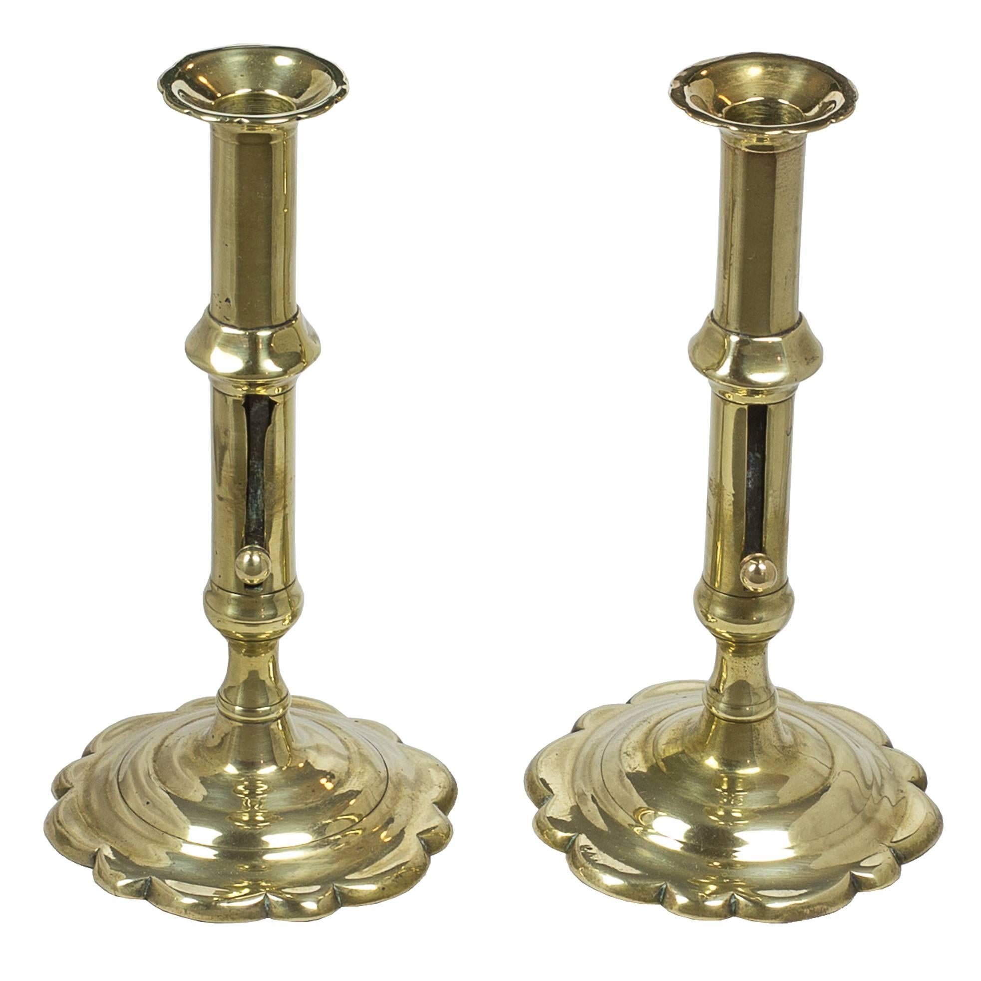 Pair of English Push-Up Brass Candlesticks, with Scalloped Edge Bases For Sale
