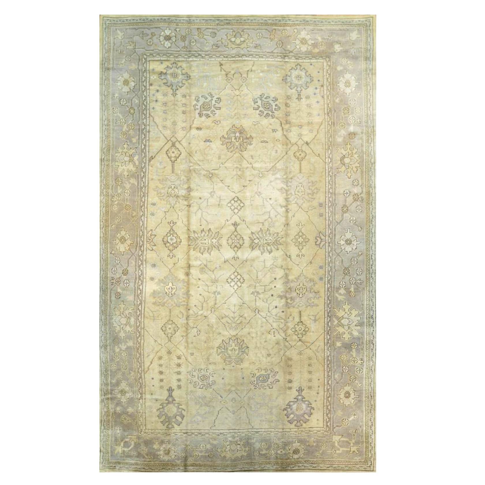 Antique Wide And Long Hand Knotted Wool Turkish Oushak Rug For Sale