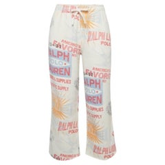 Polo Ralph Lauren Pantalón atlético de forro polar con estampado gráfico blanco S