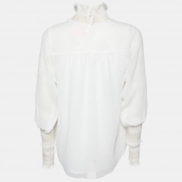 Complementa tu elegancia con una blusa encantadora como ésta. Con su bonito diseño y su tejido de primera calidad, esta blusa es la mejor elección para tener un aspecto sofisticado y desenvuelto.