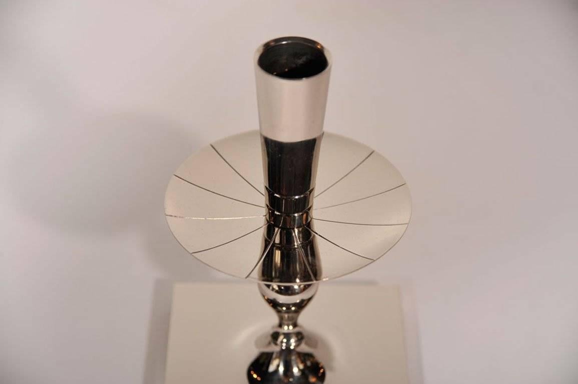 Mid-Century Modern Pair of Tommi Parzinger Polished Nickel Candlesticks For Sale