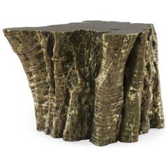 Dining table base in the form of a tree trunk
