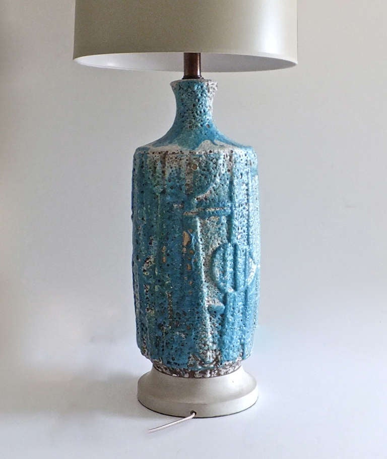 Ceramic Table lamp with blue volcanic glaze circa 1960’s with newly cerused base. Completely rewired with silk cord and bronze fixtures.