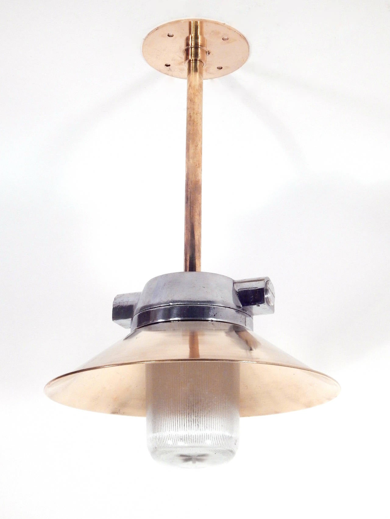 Brass and steel ships lights with holophane globes. Recently wired. Stems,  shades and ceiling canopies are new.