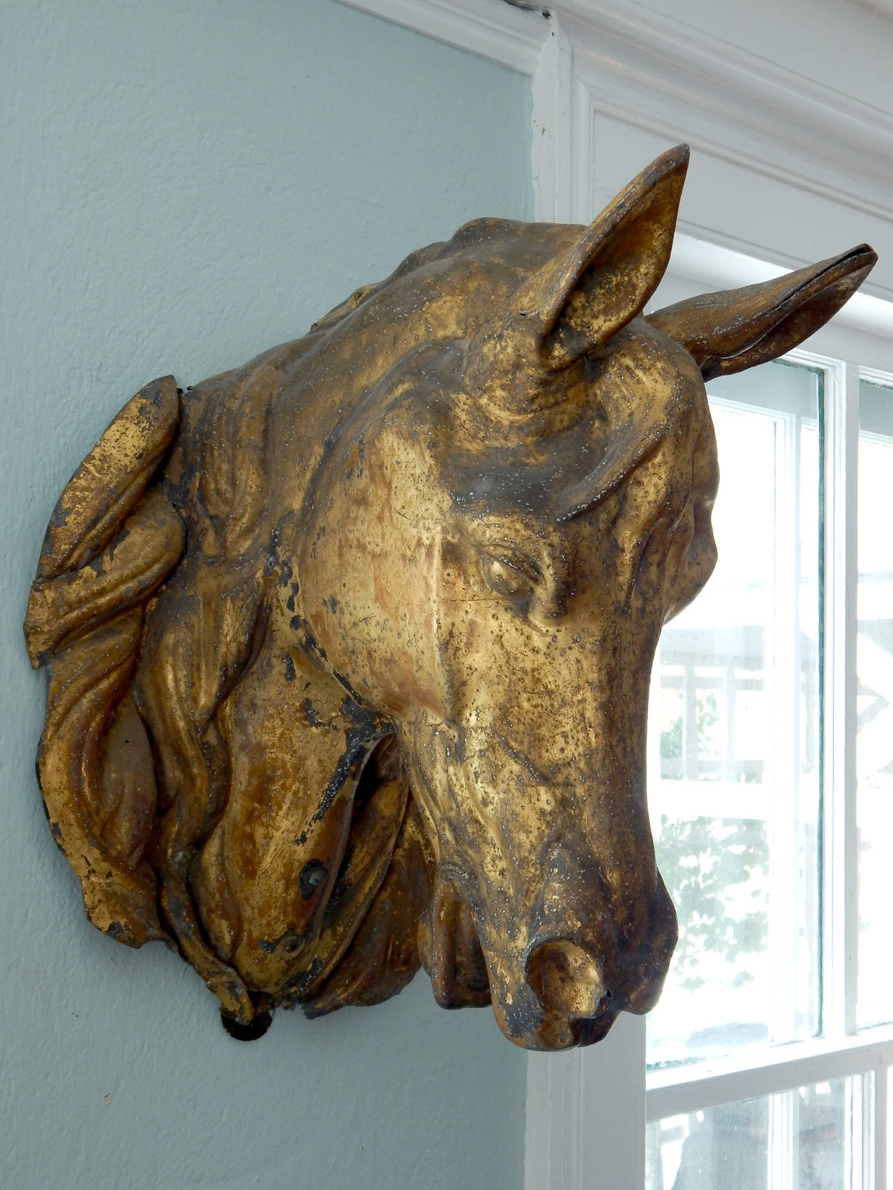 French gilded tole horse head with exceptional patina.