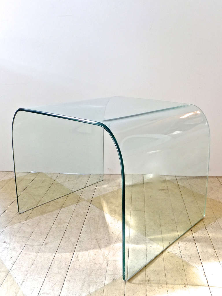 Bent glass waterfall end table in mint condition.
