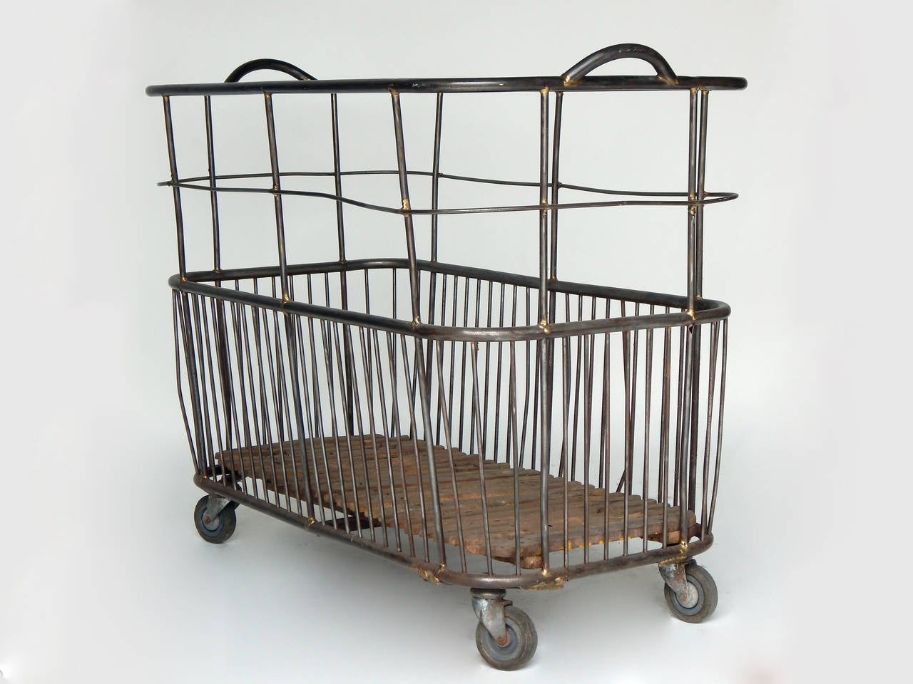 French steel baguette cart on wheels. Great for firewood, towels and toys etc.