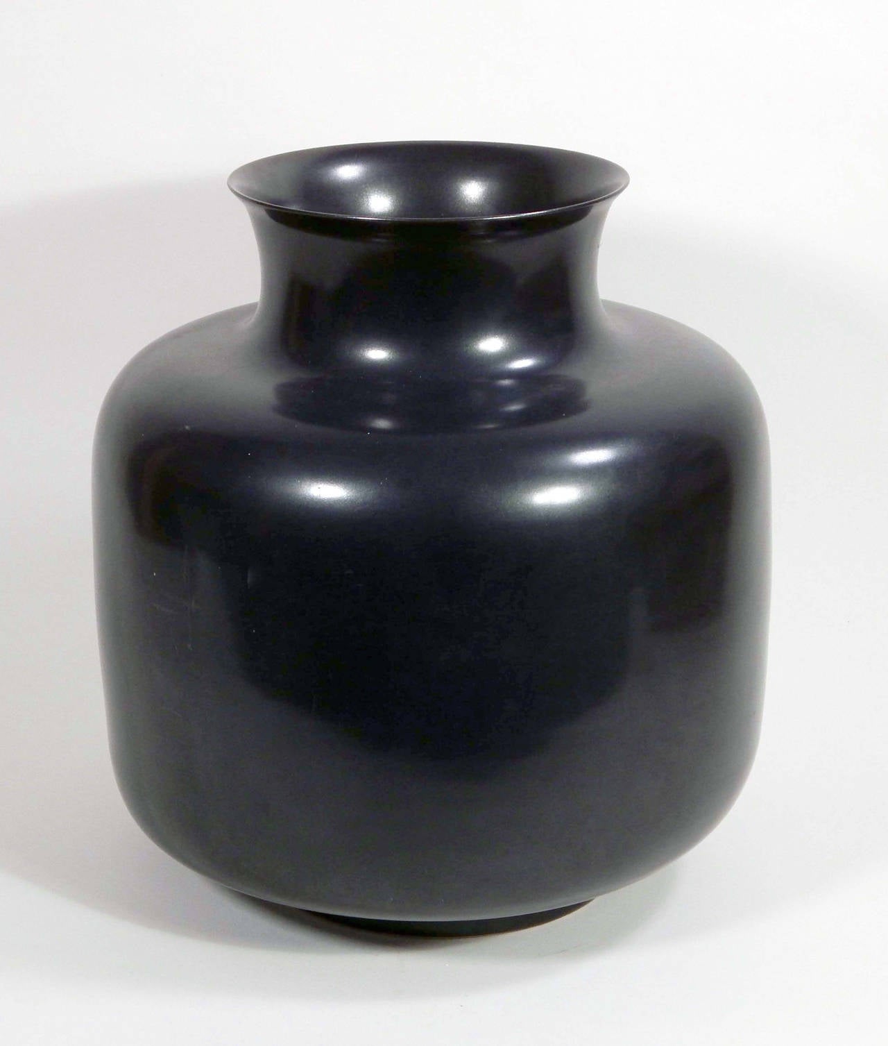 Large sensual black Asian pot in a soft, almost gunmetal glaze. Very good condition with only a few slight scratches that barely show.