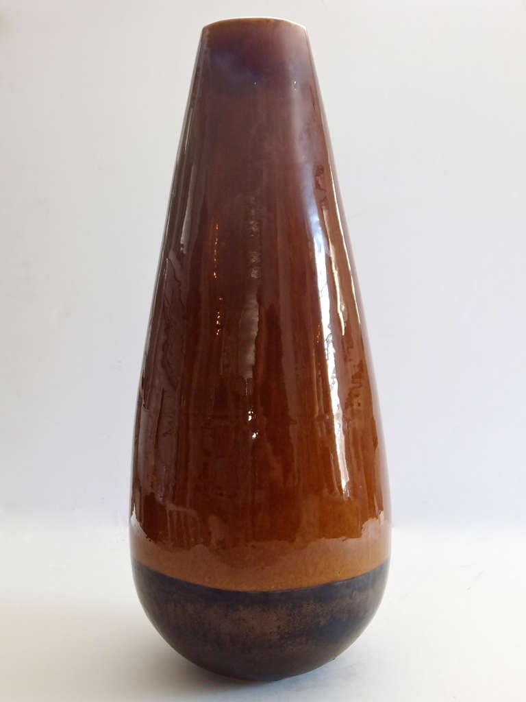 Sensational large floor vase with rich, glossy brown  glaze with bottom in matt black with copper undertones. 20