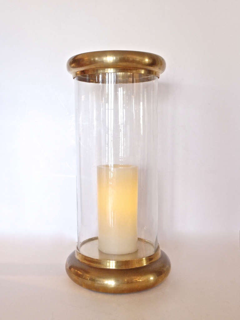 Pair of heavy, large hurricane lamps from Chapman.  Glass is beautifully wavy, giving them a subtle antique look.