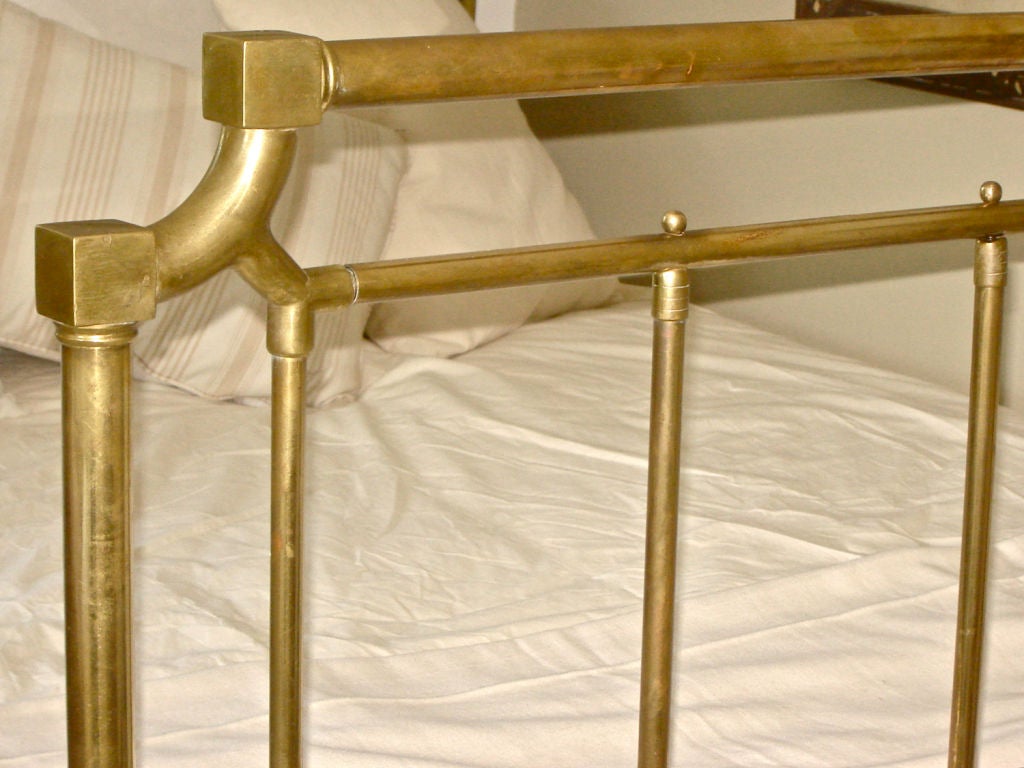 Refined French brass bed that accomodates a queen size mattress.<br />
Interior dimensions are 77