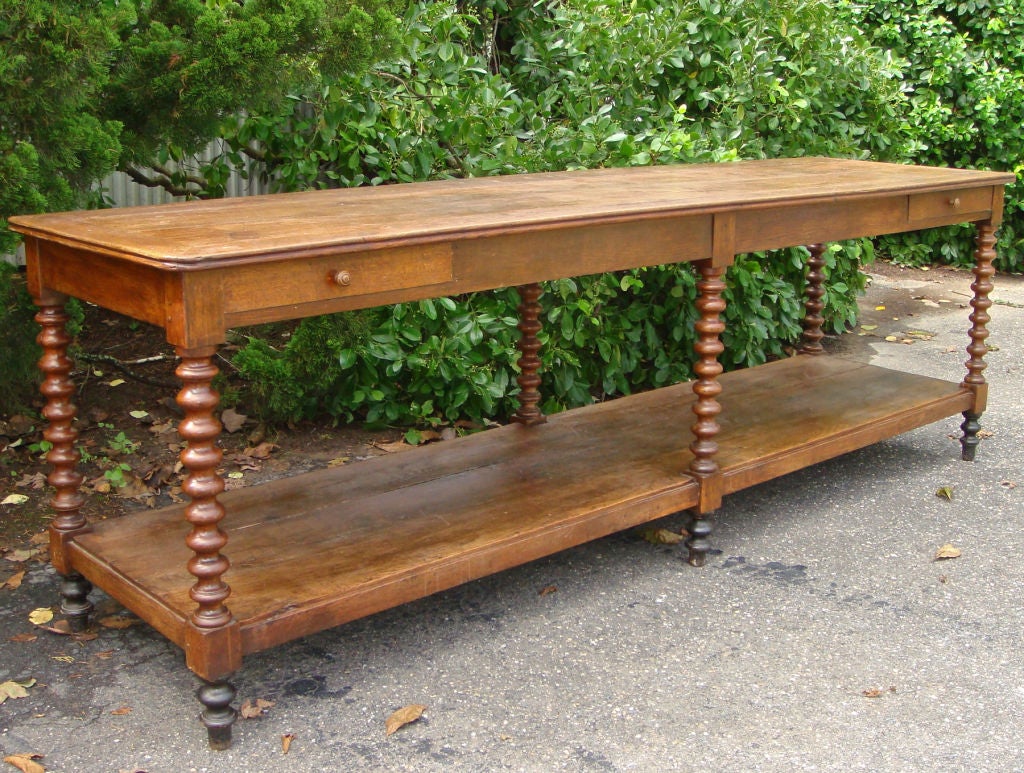 Beautiful modified barley twist long draper's console with two small drawers.