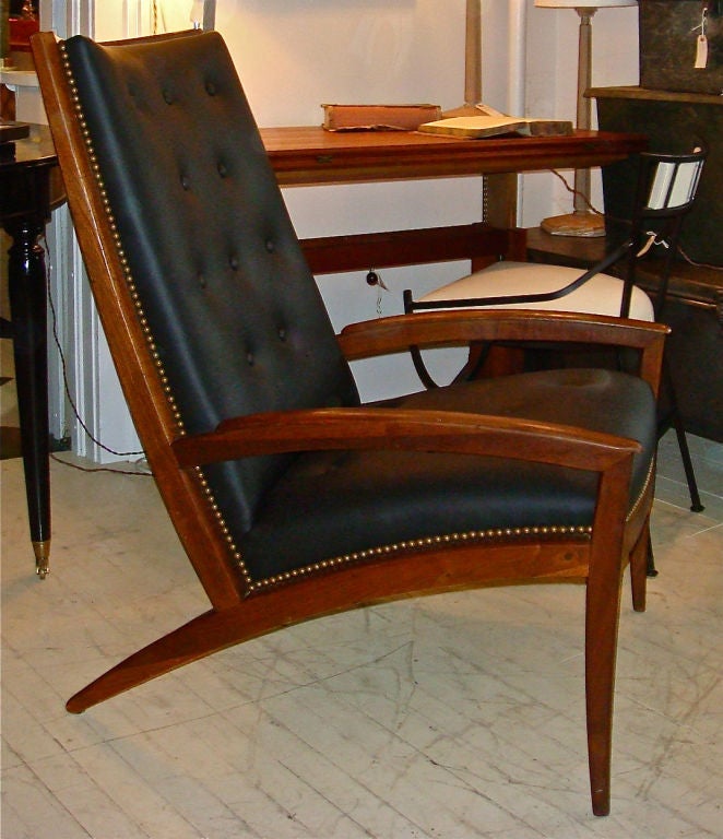 Teak armchair with new leather upholstery by Edward Wormley.