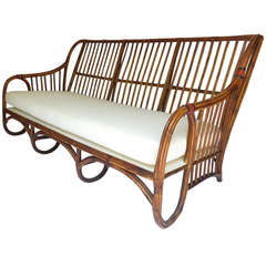 Unusual Two Piece Oval-Armed Stick Wicker Set