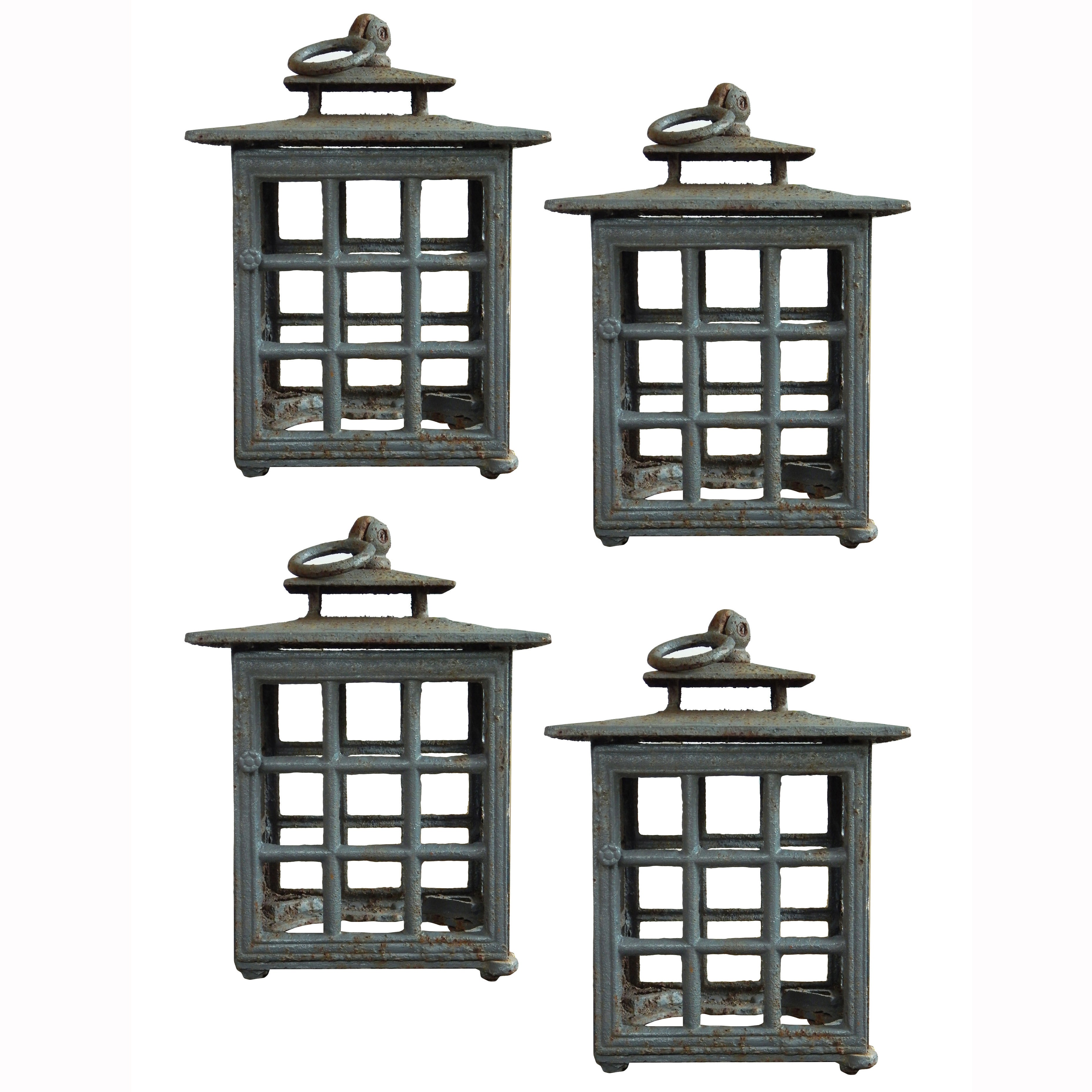 Four Decorative Painted Iron Lanterns