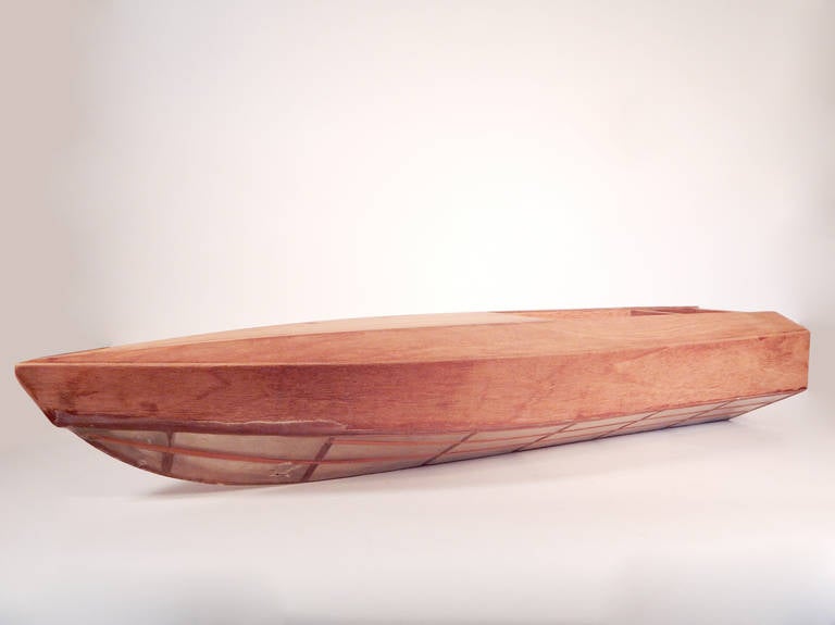 Large model wooden boat with open fiberglass bottom. A hancsome decorative object.