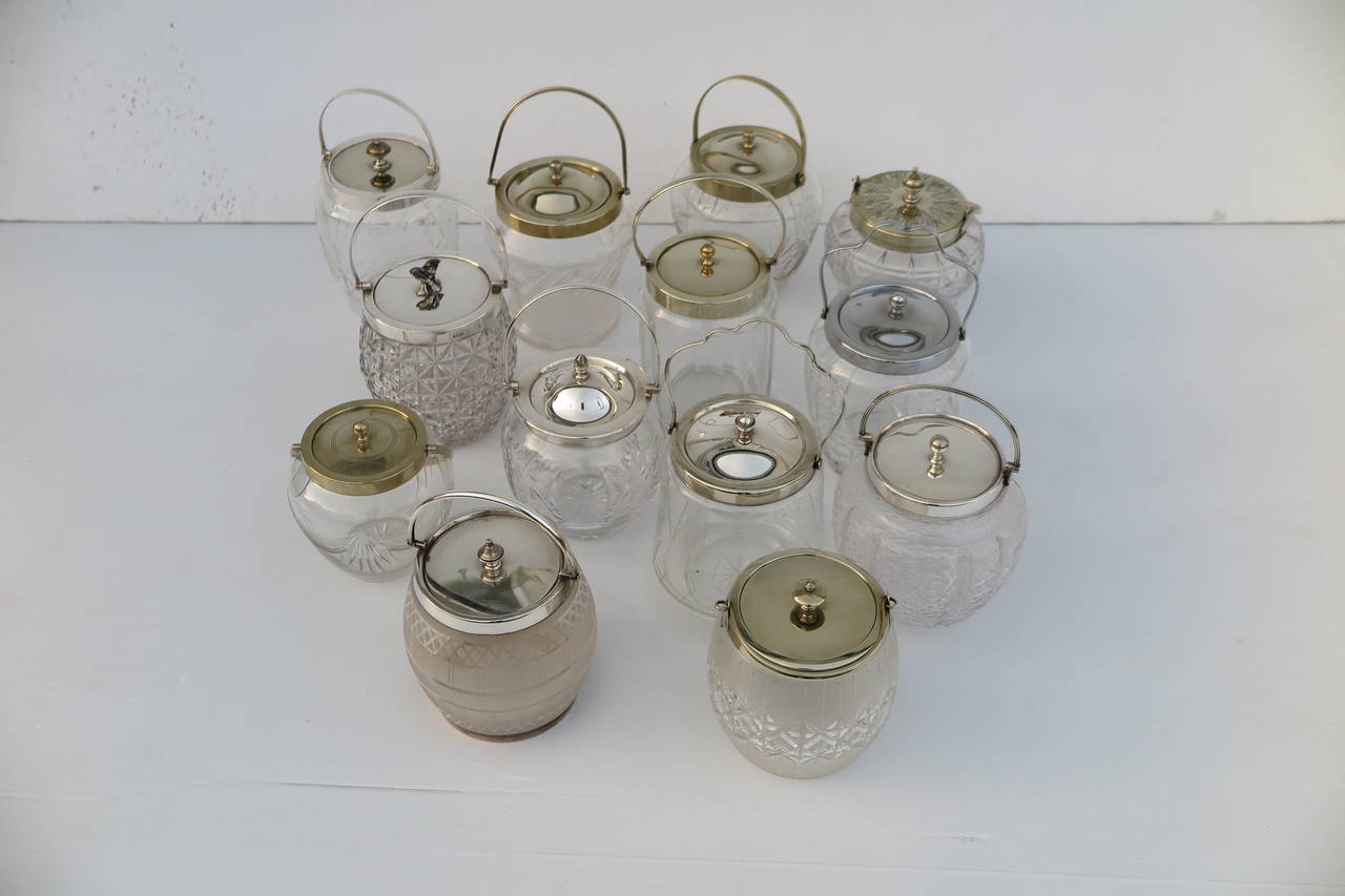 Varied cut glass motifs with silver-plated lids. Priced and sold individually from $360 to $400. Please contact for current availability and pricing.