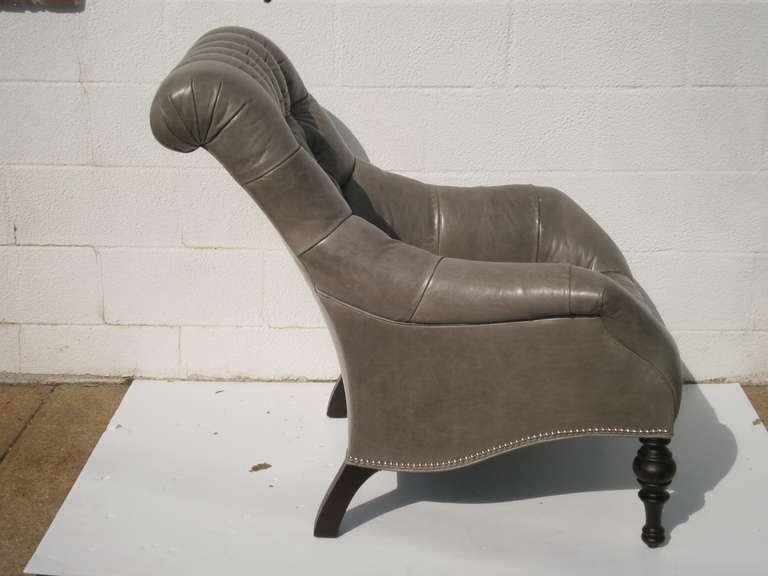 Beautiful armchair and ottoman, available in many different leathers and finishes. Chair ottoman, $1,410.00. Pricing is approximate. Please contact us for further information.