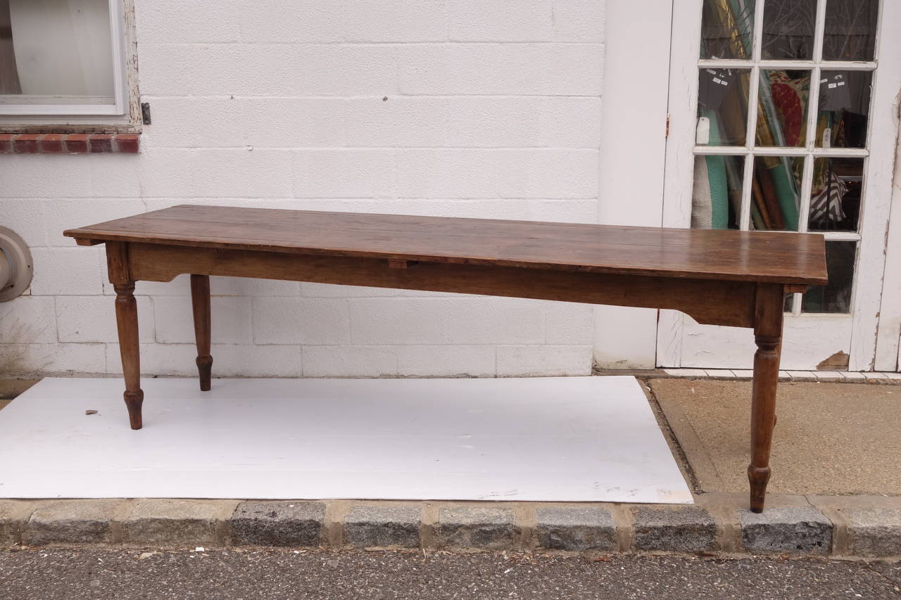 A long French table in pine, could be a dining table or a sofa table. Lovely patina.