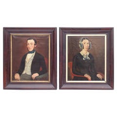 Pair of Folk Art Portraits of Woman and a Man