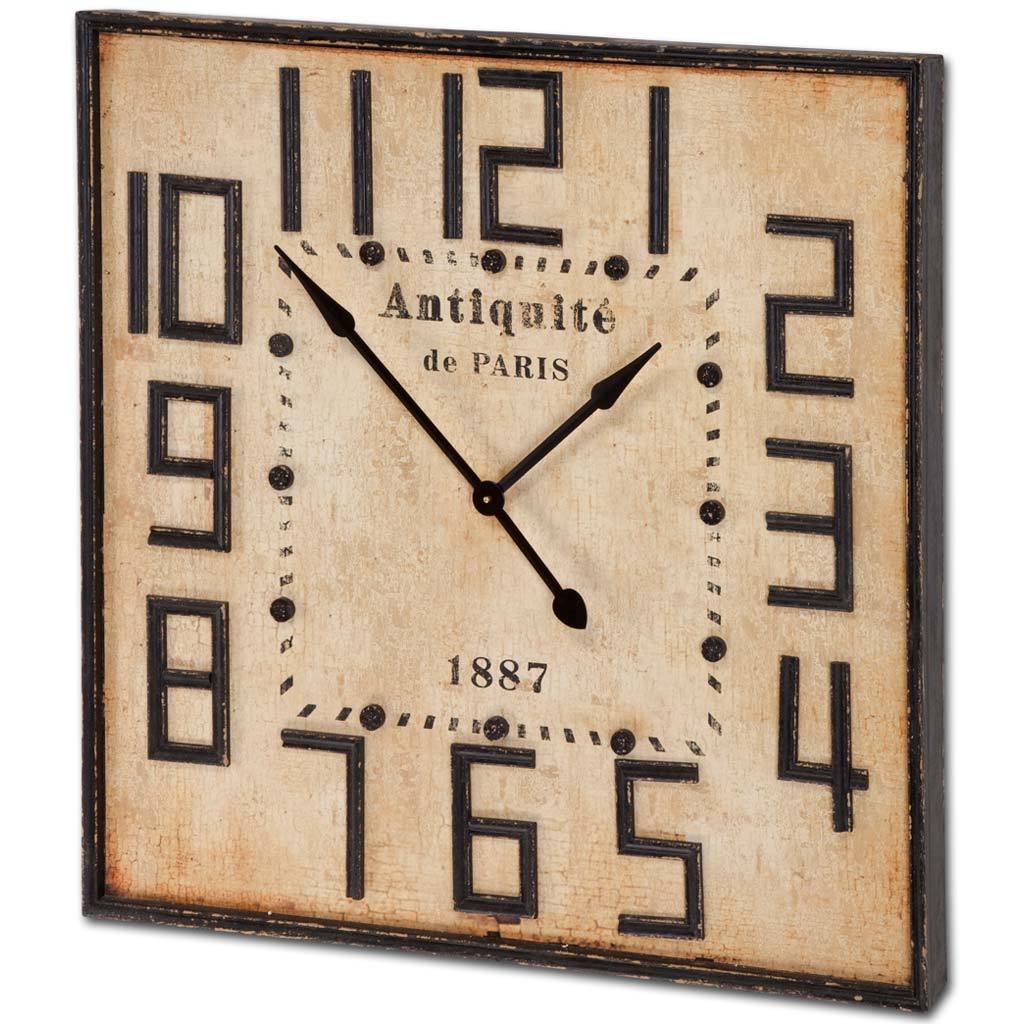Painted and antiqued wall clock in a large scale. Face reads 