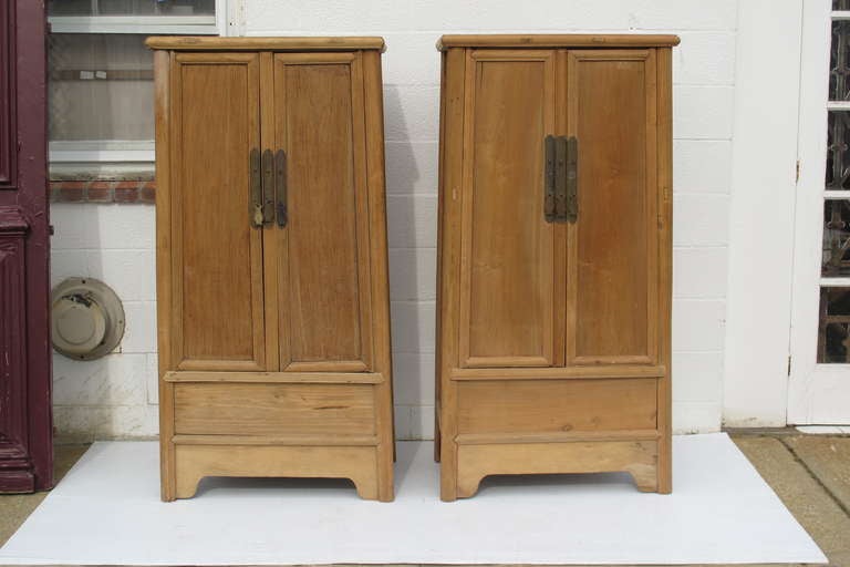 Small scale stripped Chinese armoires, ca. 1920
sold as a pair