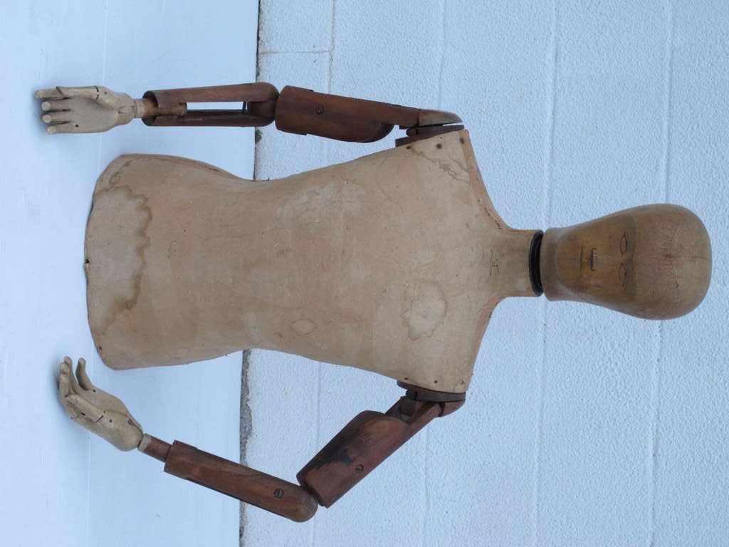 A French Tailors Dummie with carved wooden head