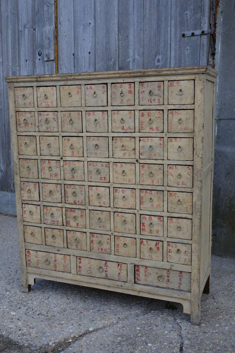 Large-scale apothecary style cabinet, with striking red Chinese characters. Please contact us for current availability.