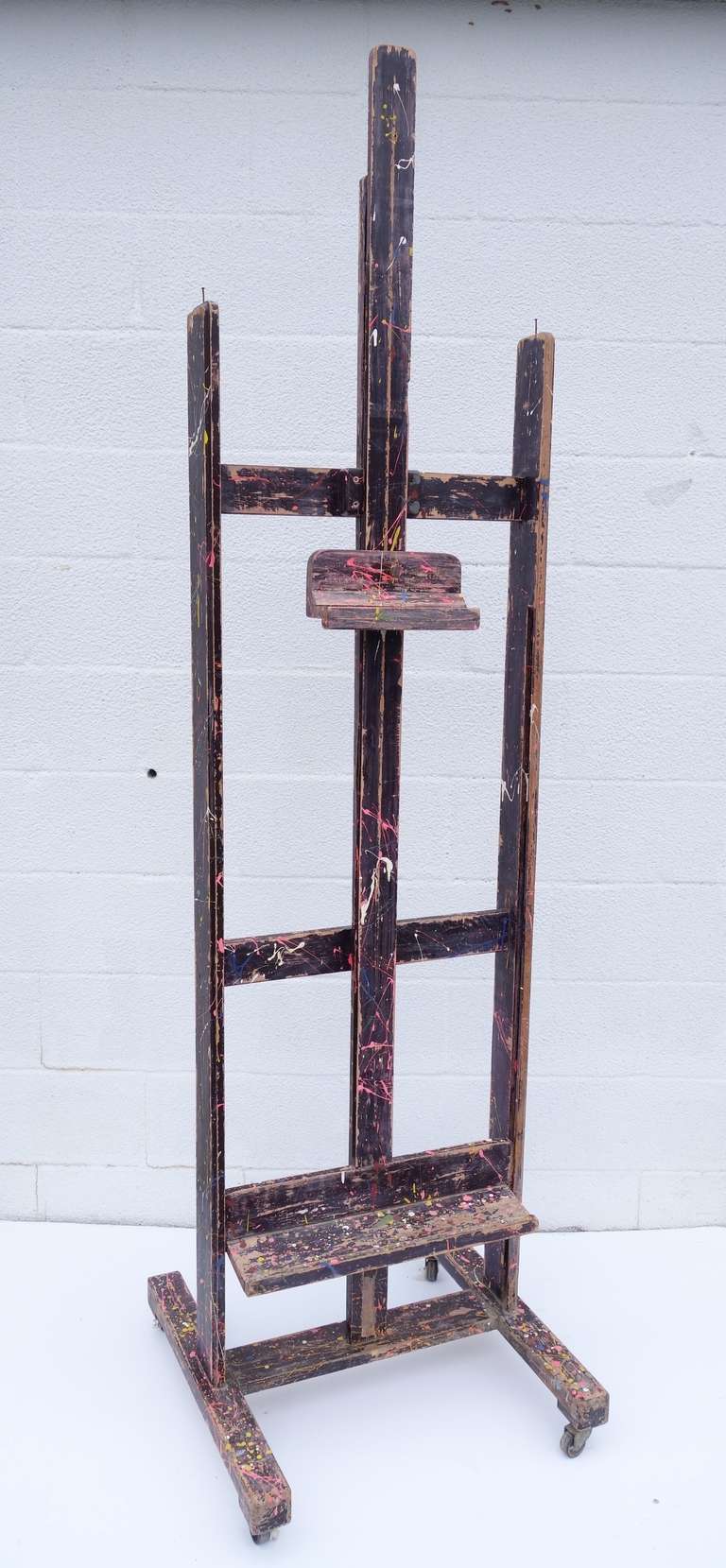 Painter's easel, complete with artist's paint splashes
