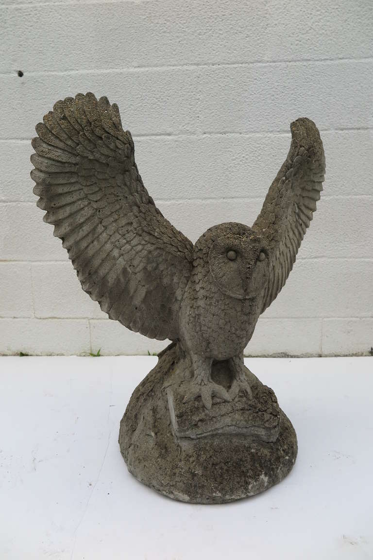 Owl sculpture of composite stone.