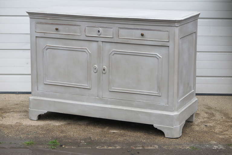1920's French sideboard repainted later. Sideboard has 3 drawers and 2 door cupboard with shelf