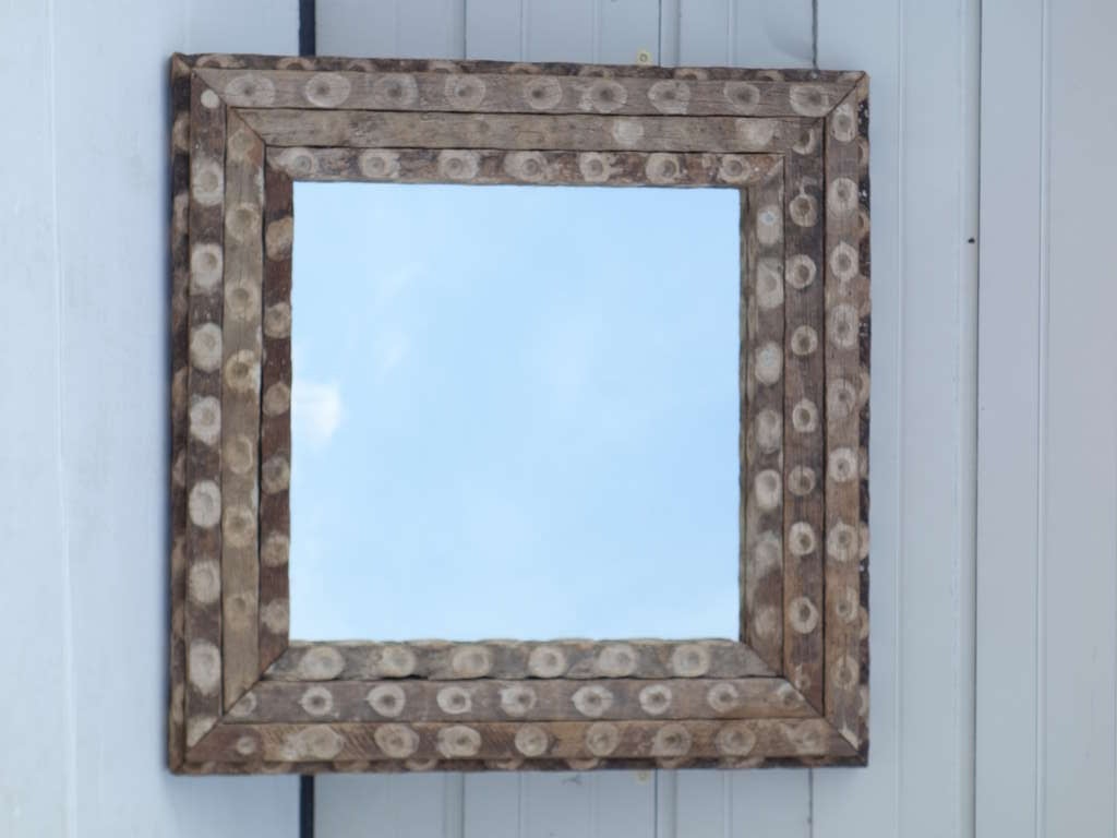 Mirror with frame made out of old French oyster collecting poles (cut down). 
