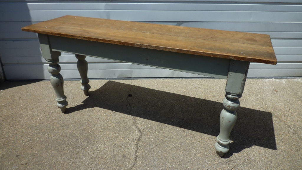 An English console table or server with turned legs. Old grey paint and waxed pine top. Good sturdy condition.