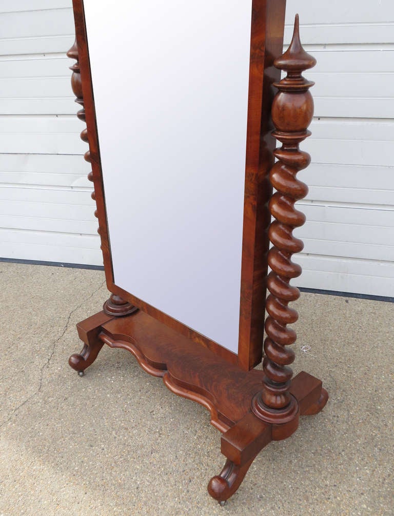 Standing mirror with carved barley twist supports and original mirror