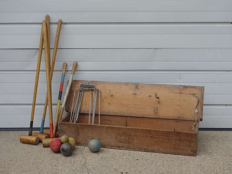English wooden croquet set with wooden case, c. 1950.