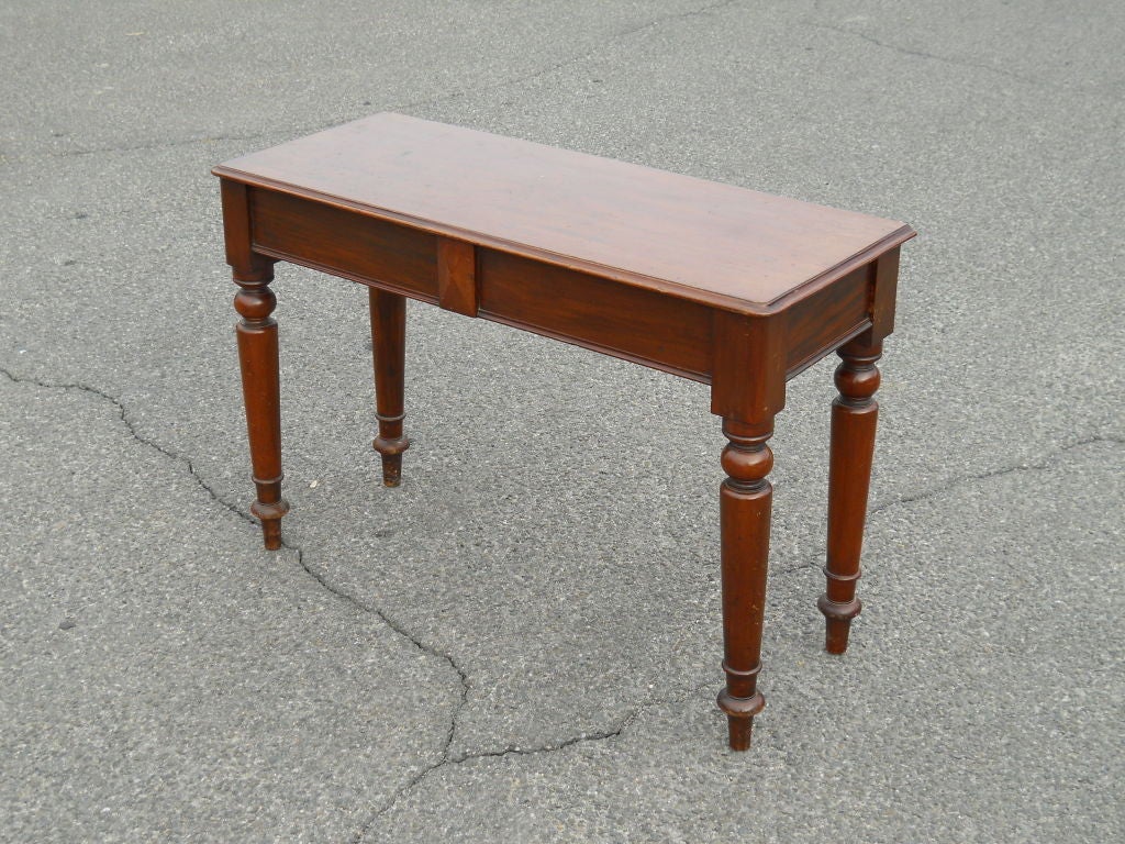Victorian walnut console table with one side drawer for secret storage.