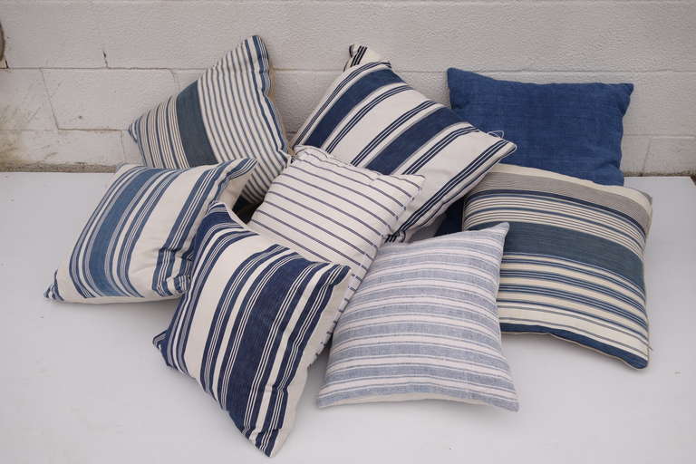 Down pillows covered in 1930s French ticking. Prices range from $225. - 300.00 PLEASE CONTACT US FOR CURRENT STOCK AND AVAILABILITY