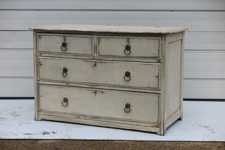 1920s Dutch chest of drawers with pull ring handles and original paint.