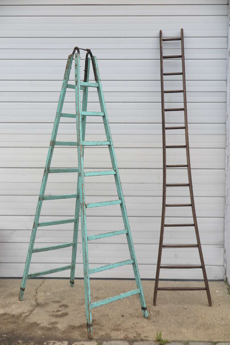 English apple picking ladders, circa 1950s. Blue Ladder $1,250.00. Brown $750.00