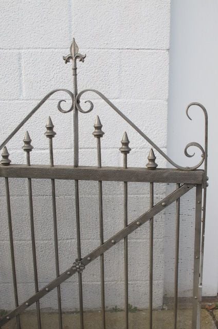 Iron Firescreens, made from old victorian gates which have been restored and cleaned, both have Mesh inserts. Sold Separately. 

Left hand small verison: 30