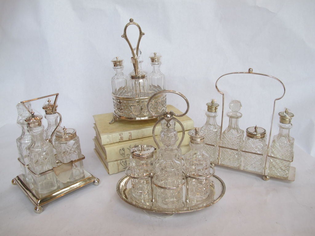 We have a large selection of 1900's glass and silver plate condiments sets. Sold in individual sets of 2, 3 and 4 bottles in a stand, from $250 - $ 450