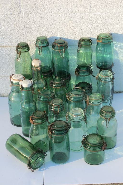 Selection of French c 1900 preserving jars in various shapes and sizes with original closures and lids. Some with porcelaine lids. SOLD SEPARATELY $65 to $225.