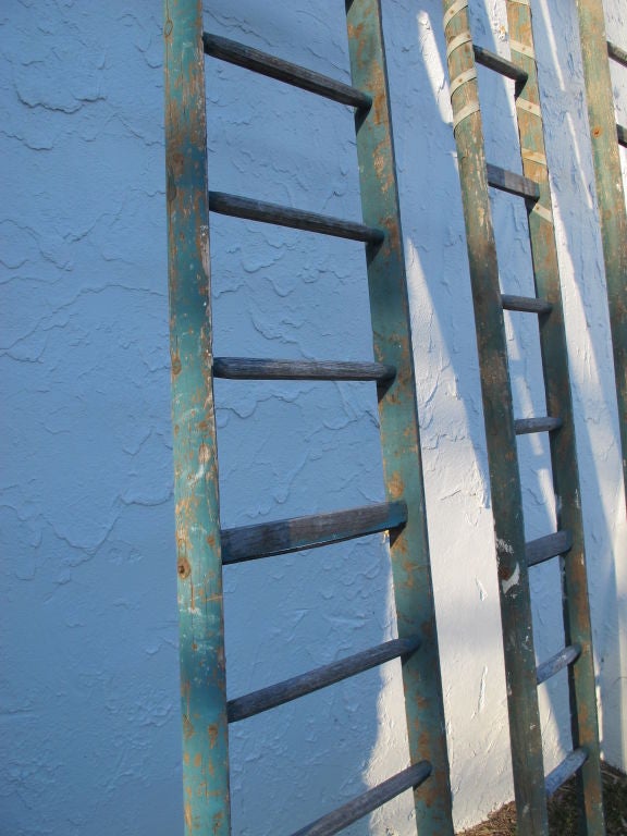 3 vintage painter's ladders. Sold separately for $600 each.

Left: 127