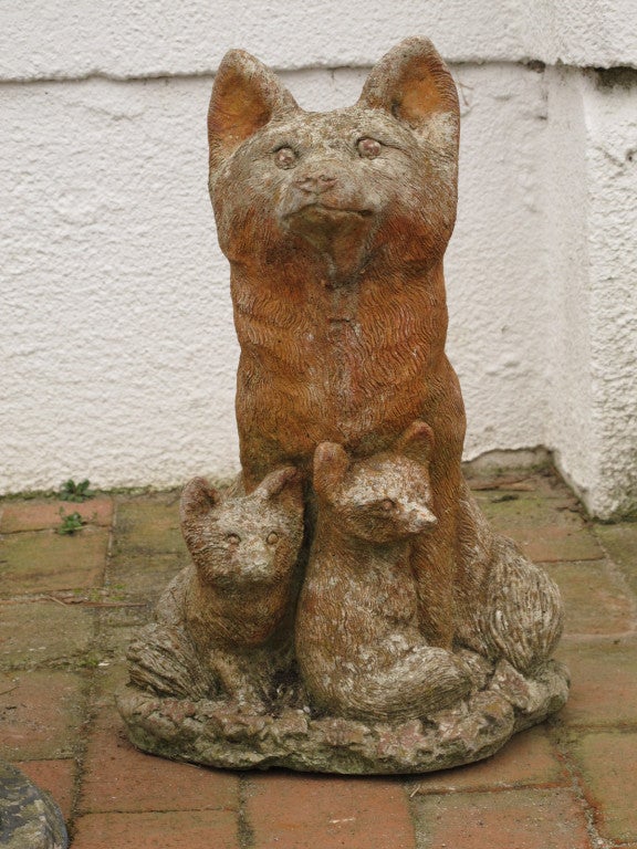 A collection of English stone animals with remains of old paint. Fox still available. Squirrel and Dog have been sold.
