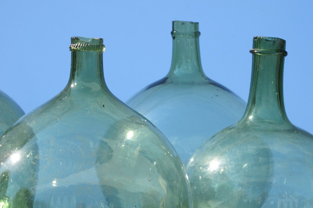 French Green Glass Wine Storage Jars. Make great lamps, or decoration. Sold Separately from $385 - $ 600. Please contact us for current availability.